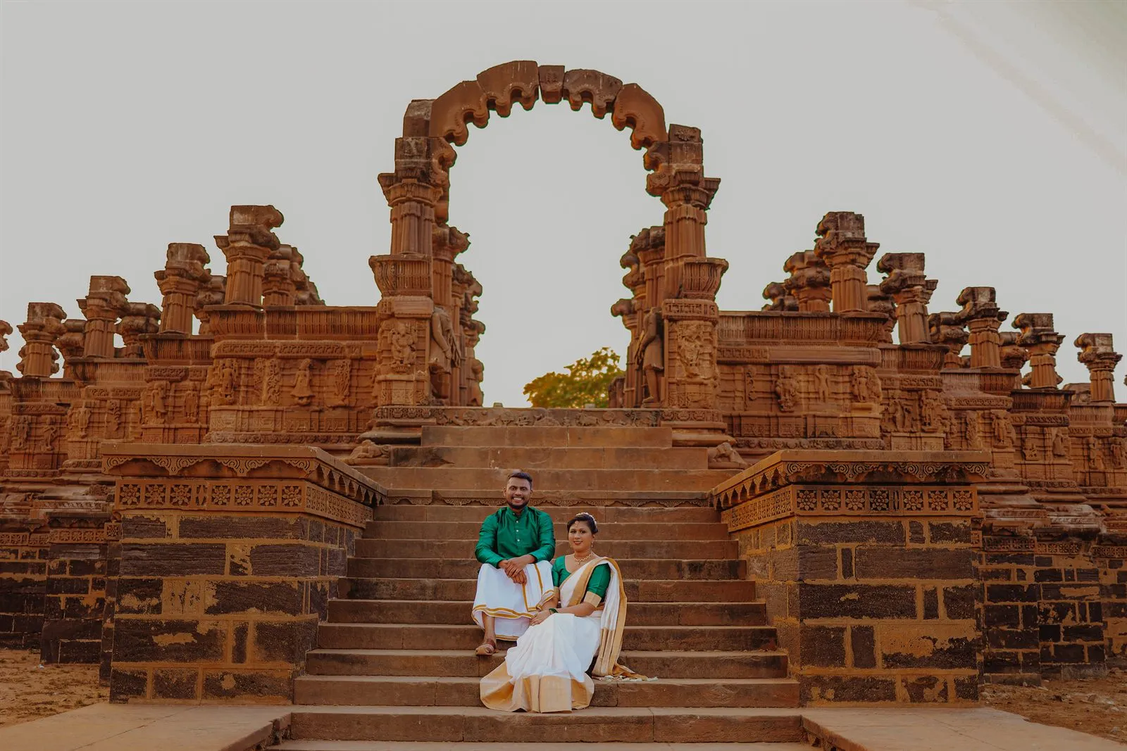 Couple at a heritage stone monument