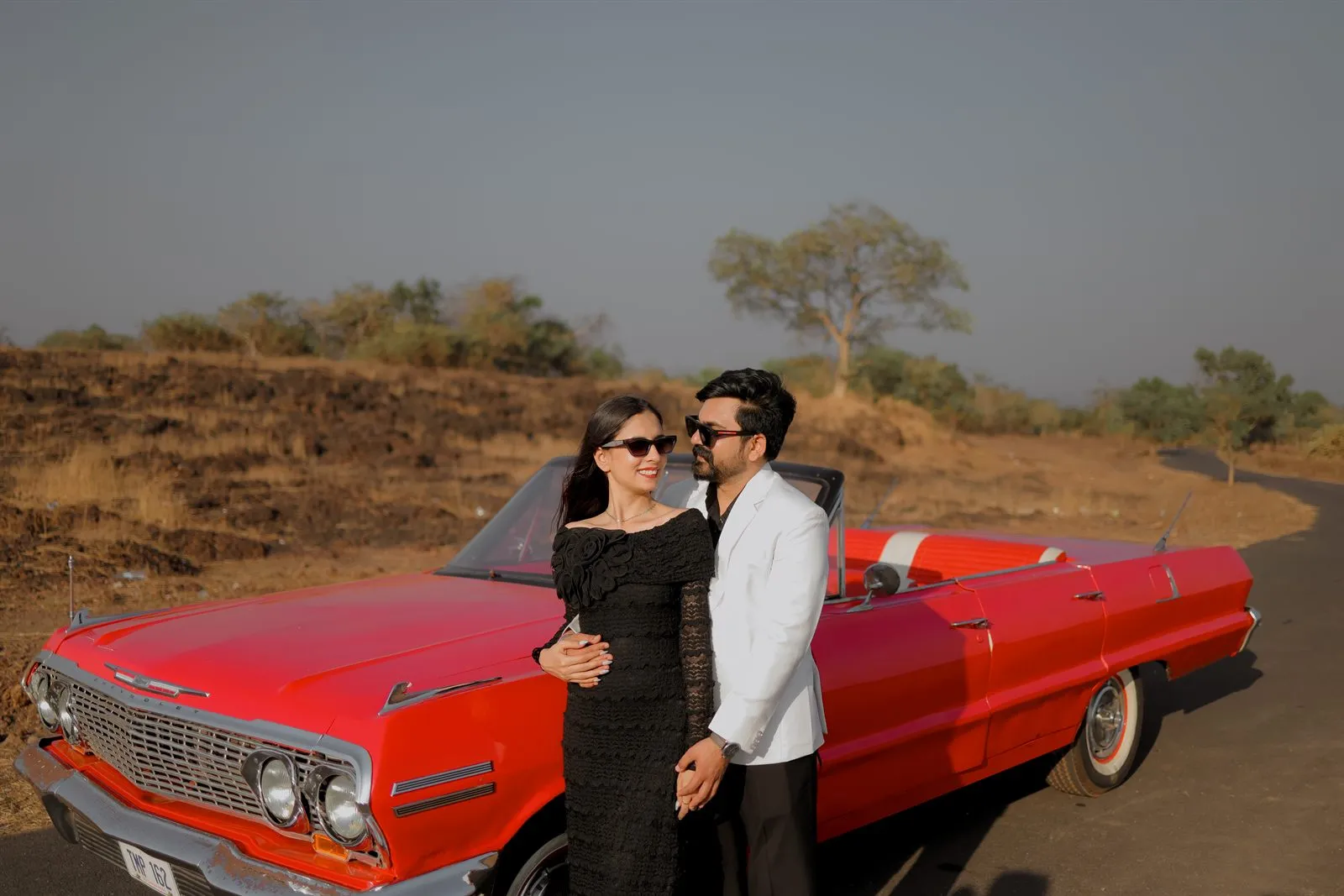 Pre-wedding couple at golden-hour sunset