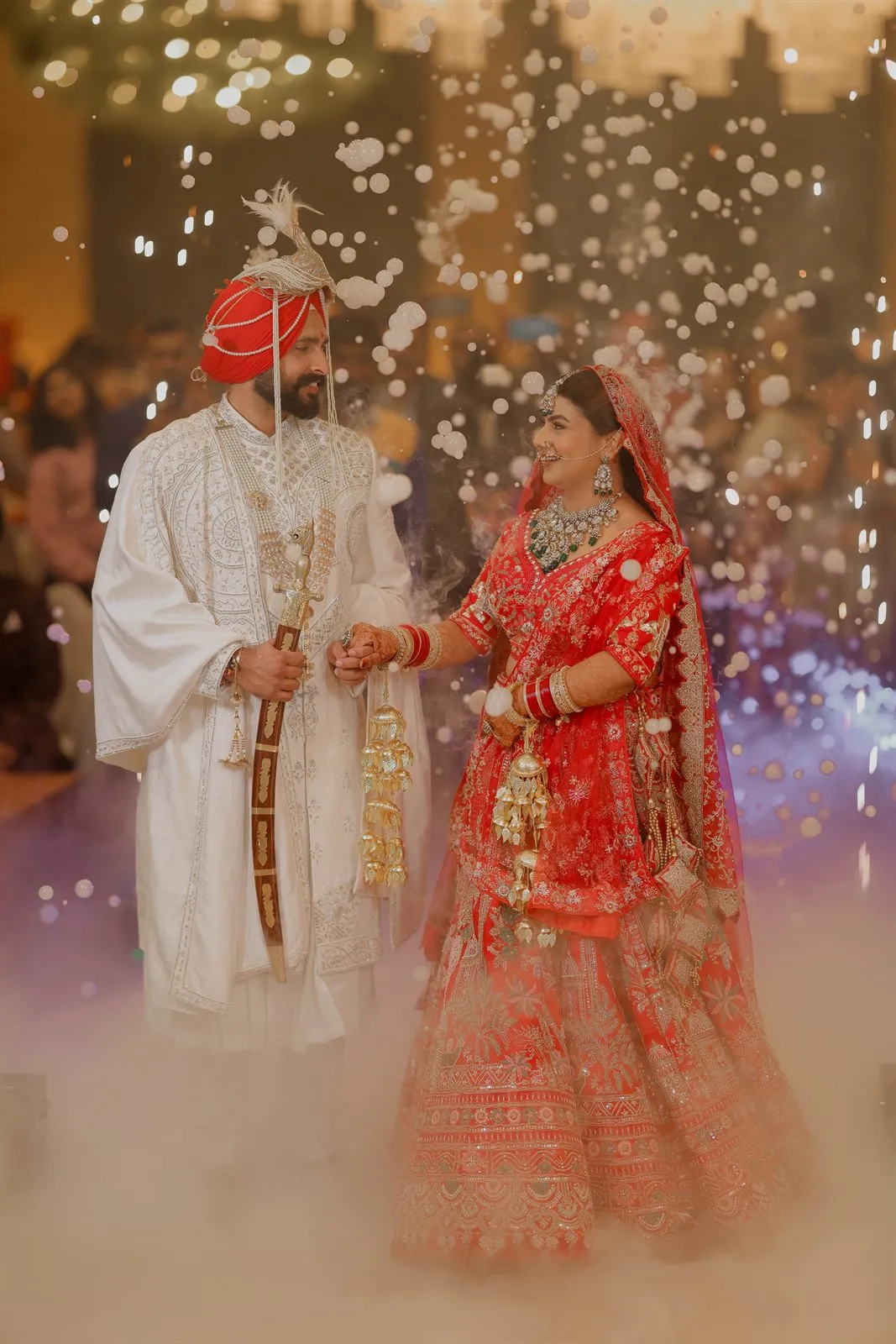 Couple amid sparklers