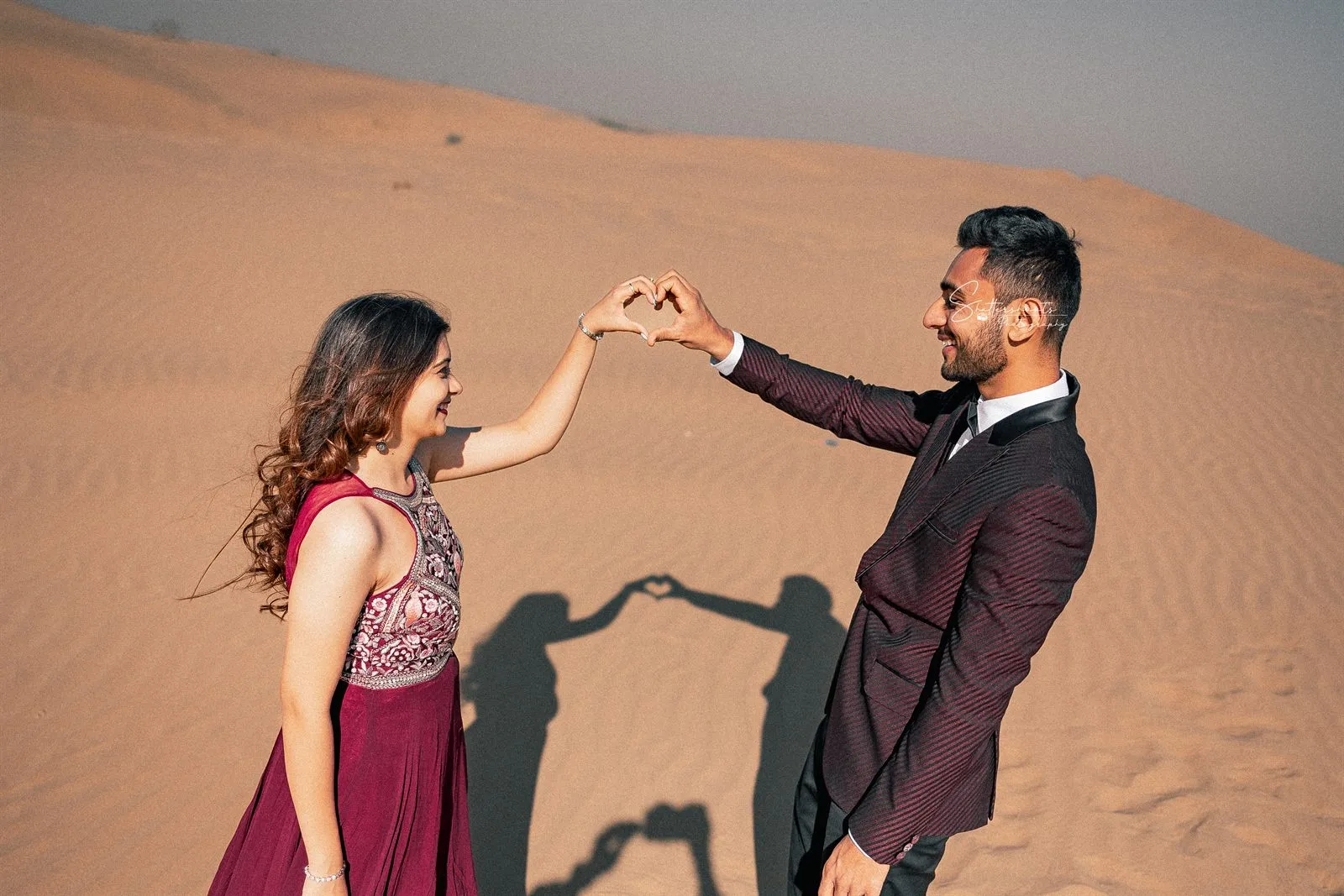 Couple in the desert at golden hour